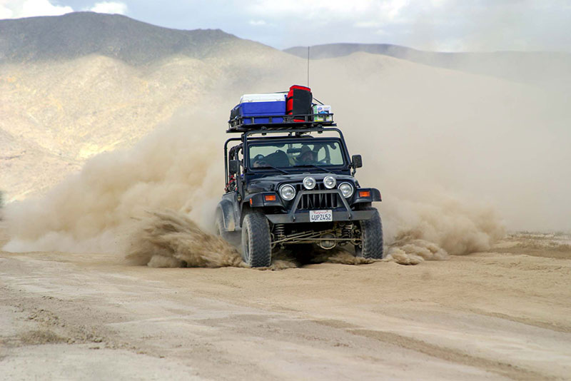 jeep driving in sand