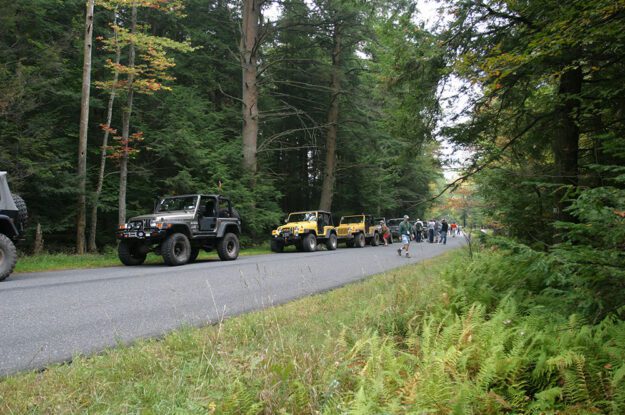 jeeps on side of road