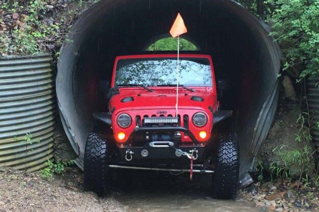 red jeep in tunnel